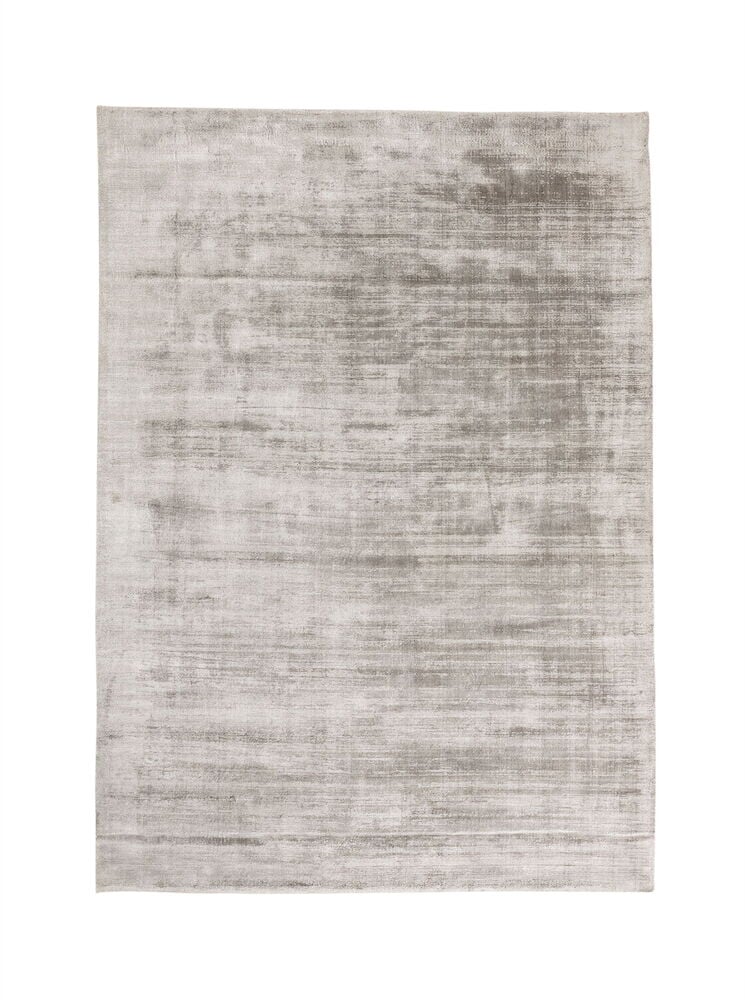 Grå handvävd matta med mjuk silkeseffekt.