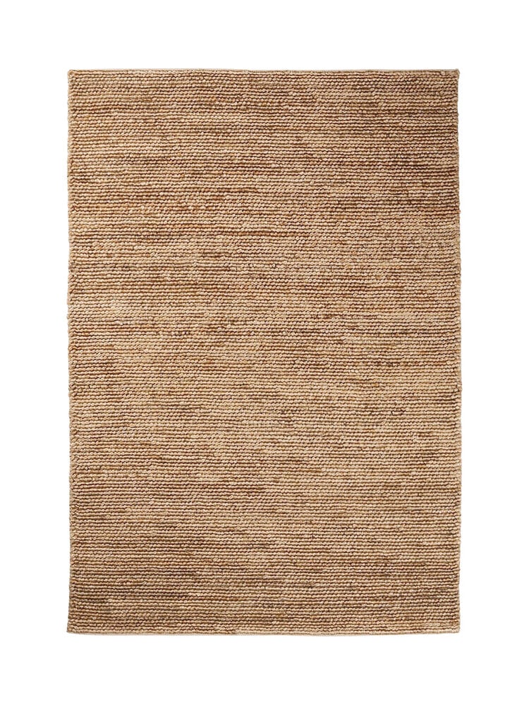 Naturlig handvävd jute matta i rektangulär form.