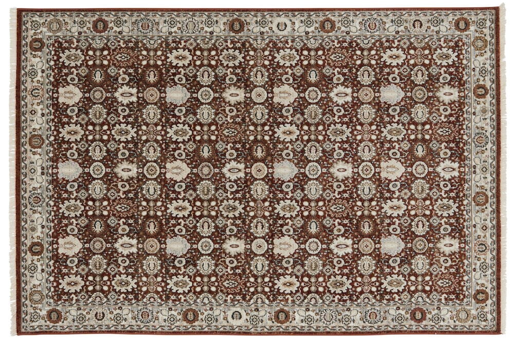 Itämainen monivärinen matto koristeellisilla hapsuilla.