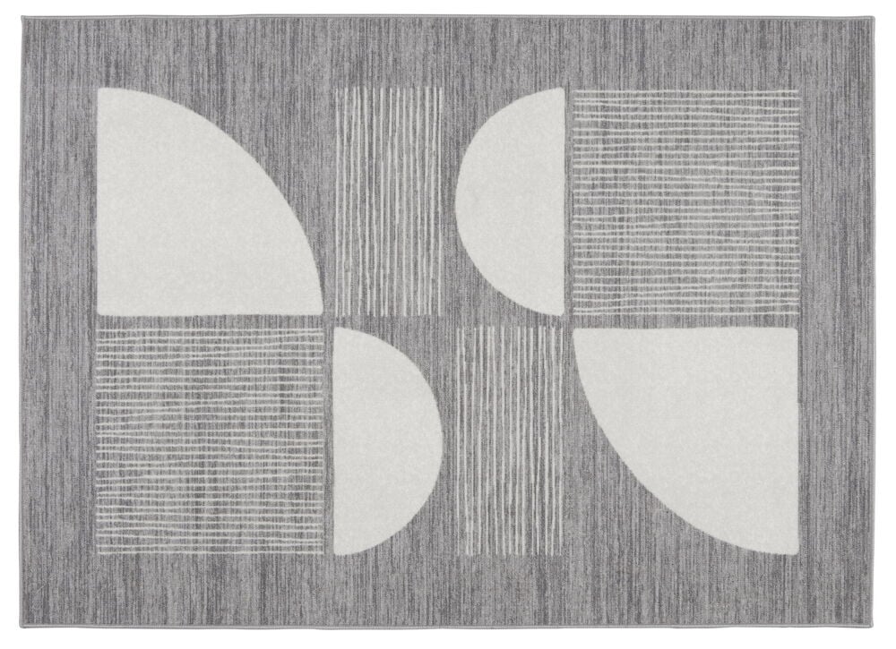 Grauer Teppich mit weißem geometrischem Muster.
