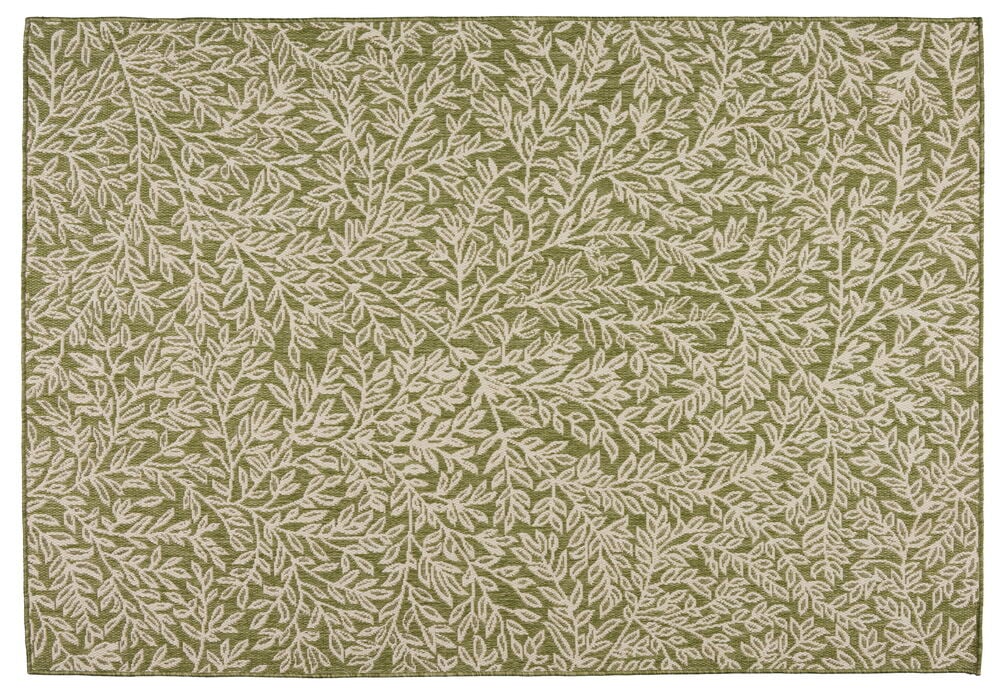 Grön matta med elegant bladliknande mönster.