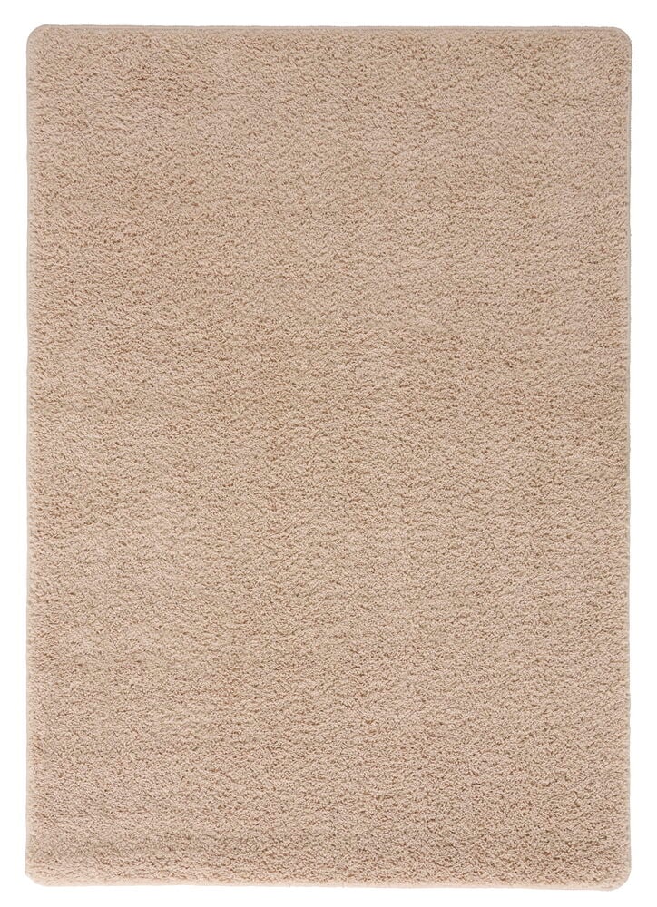 Matta Tilda, en beige matta i polypropen med texturerad yta, sedd uppifrån.