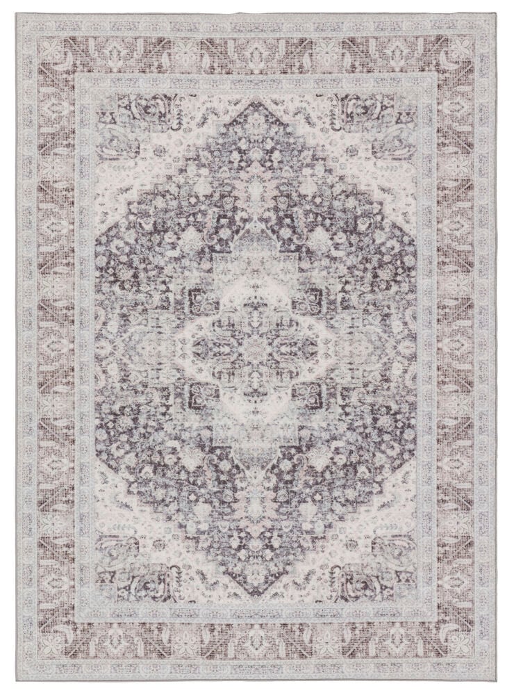Teppich Carina 133x185 cm Mehrfarbig Polyamid, mit einem abgenutzten traditionellen Medaillonmuster in Weiß und Grau.