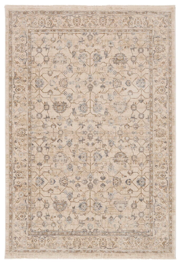 En rektangulär Amira beige polyestermatta med ett slitet utsmyckat traditionellt mönster.