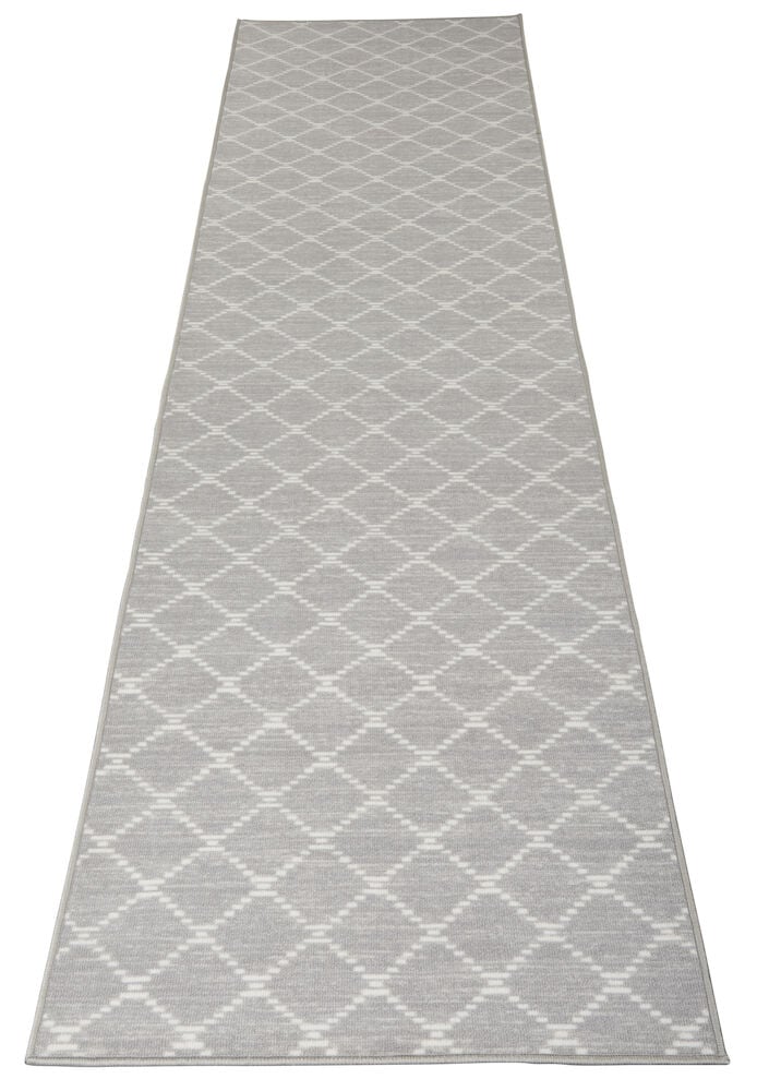 Pitkä harmaa käytävämatto hillityllä timanttikuvioinnilla.