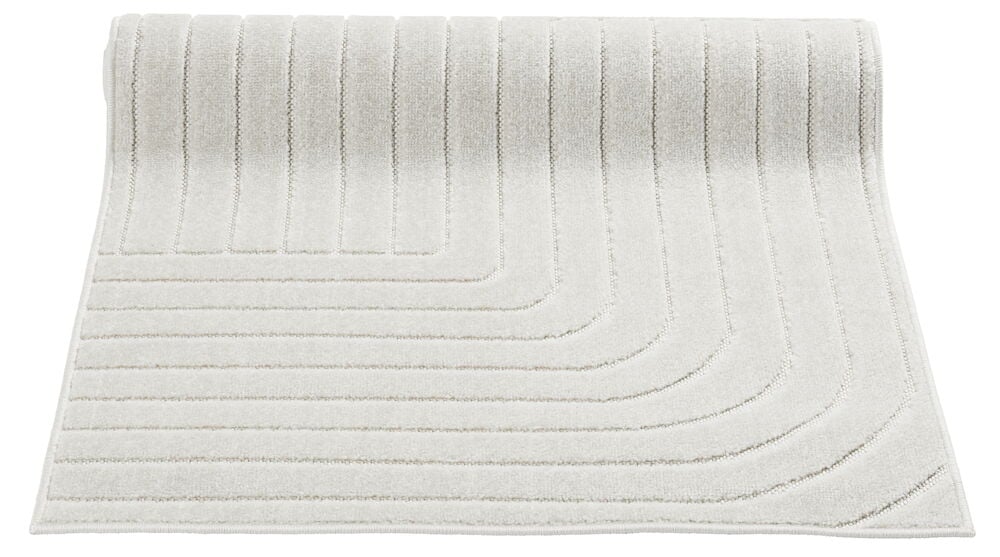 Off-white käytävämatto hillityllä kuviolla.