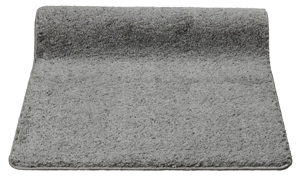 Grauer Läuferteppich mit weichem Flor und gummierter Rückseite.