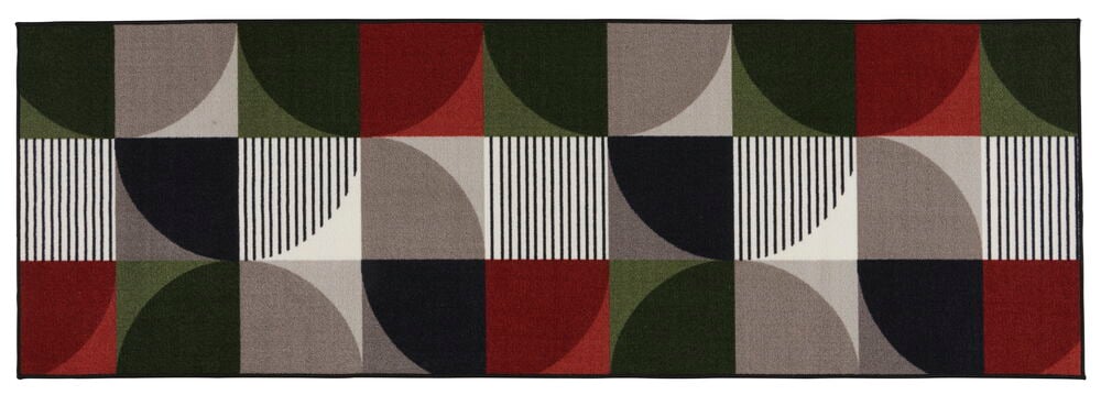 Käytävämatto, jossa on abstrakti kuvio monissa väreissä.