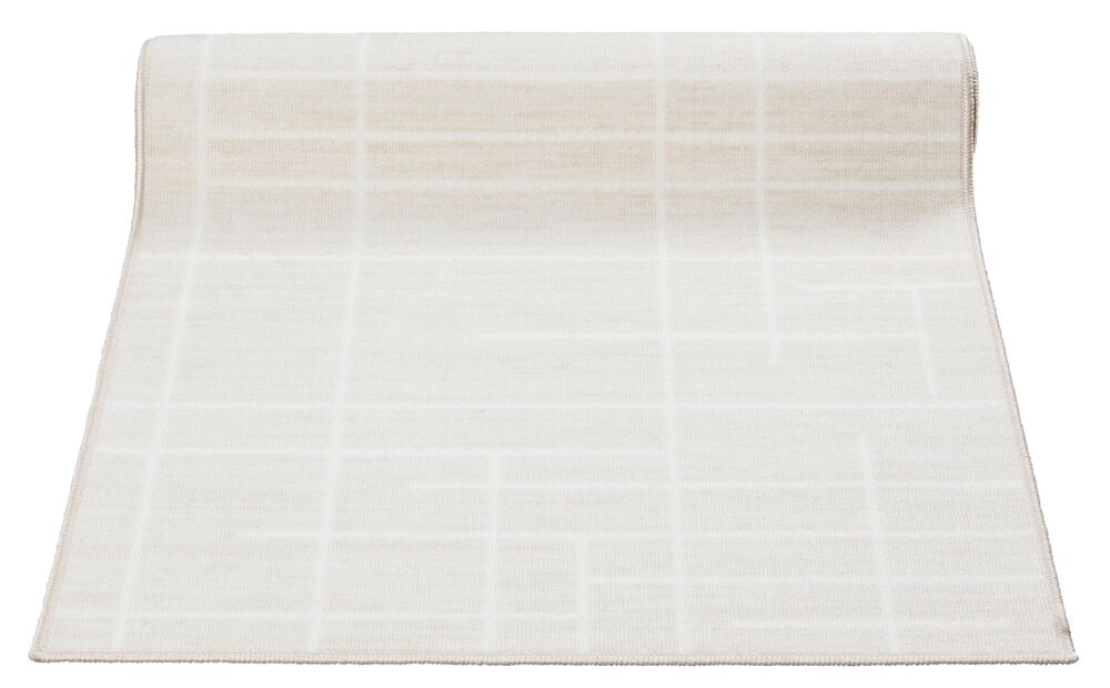 Vaaleanbeige käytävämatto graafisella kuvioinnilla.