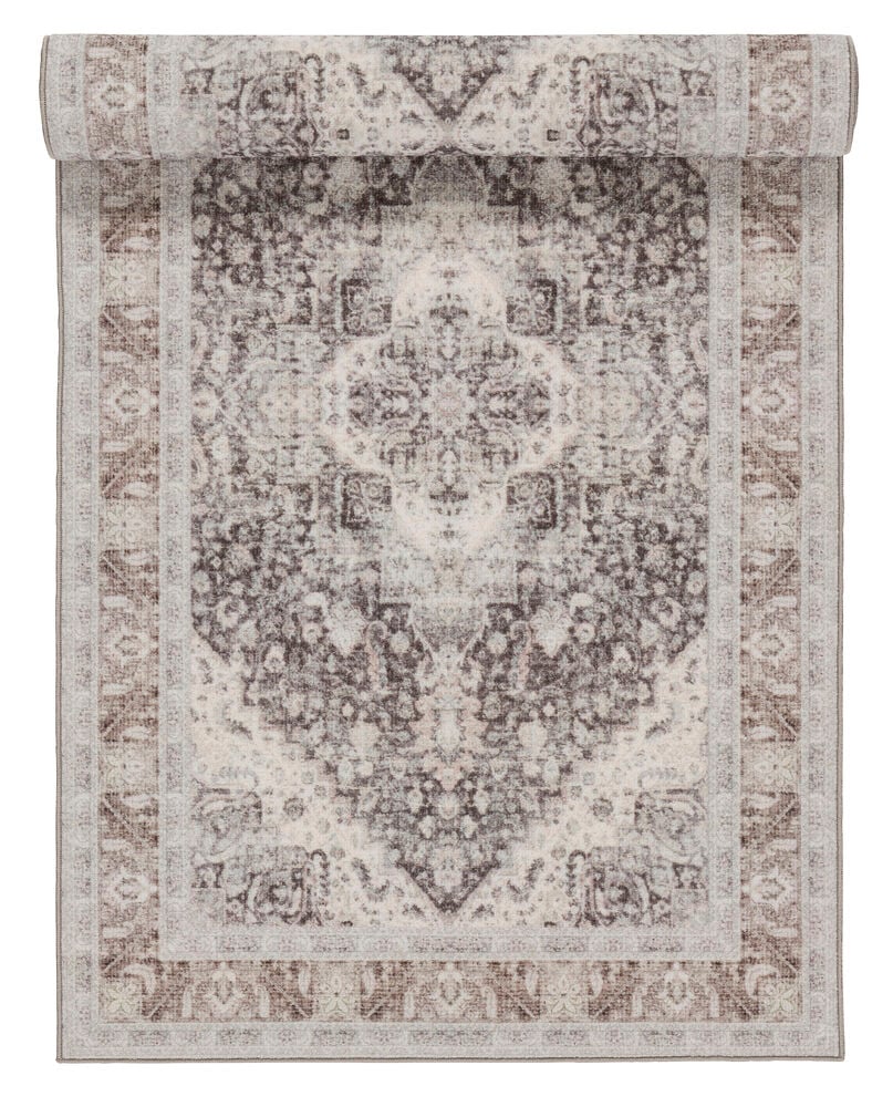 Läufer Carina 80x160 cm Mehrfarbig Polyamid mit verblasstem traditionellem Muster, teilweise aufgerollt, von oben.