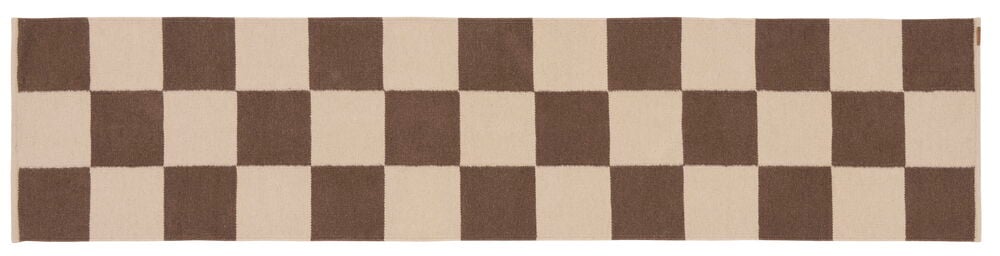 Suorakaiteen muotoinen ruskea ja beige ruudullinen villamatto.