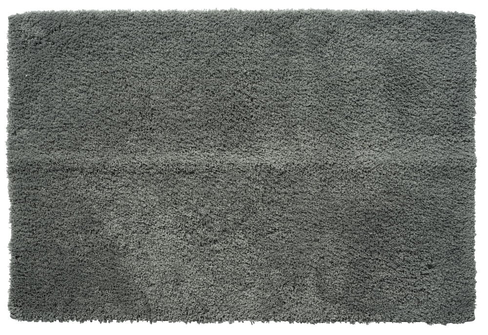 Rektangulär grå badrumsmatta med mjuk lugg.