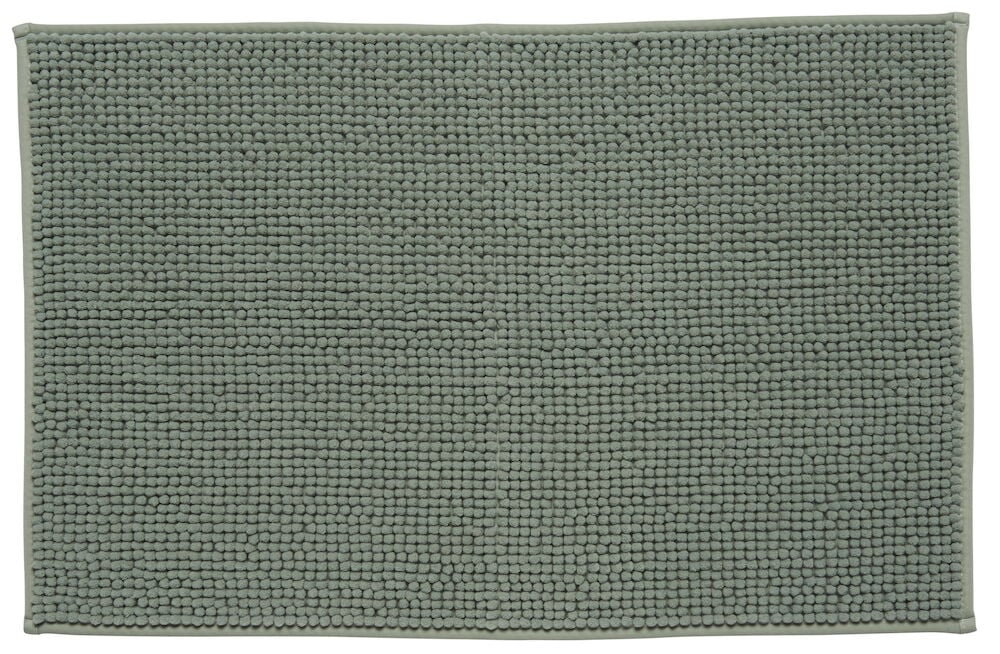 Rektangulär grön badrumsmatta med strukturmönster.