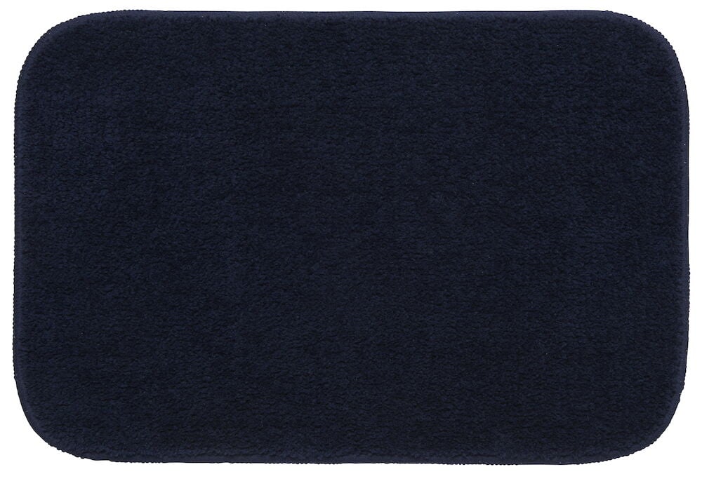 Rektangulär grön badrumsmatta med mjuk yta.