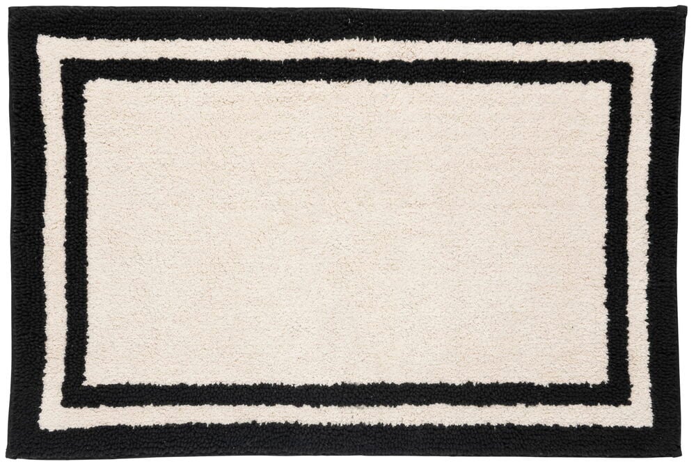 Beige kylpyhuonematto mustalla graafisella reunalla.