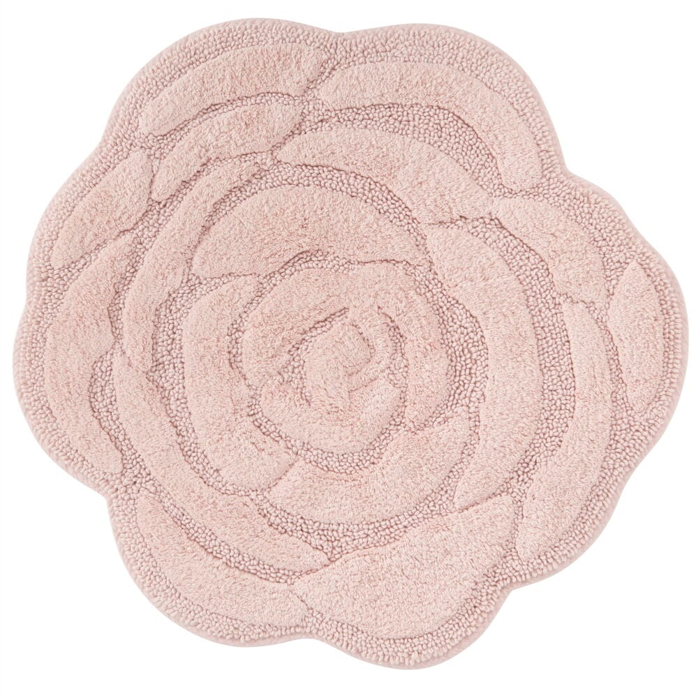 Pyöreä kylpyhuonematto ruusun muodossa.