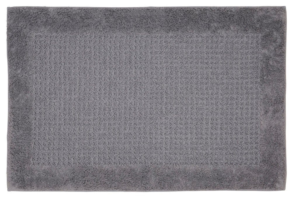 Rektangulär grå badrumsmatta med strukturerad yta.