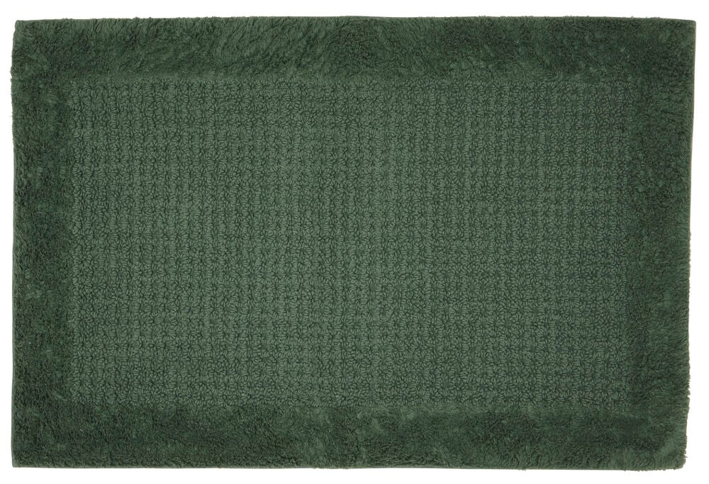 Suorakulmainen vihreä kylpyhuonematto, jossa on rakennekuvio.