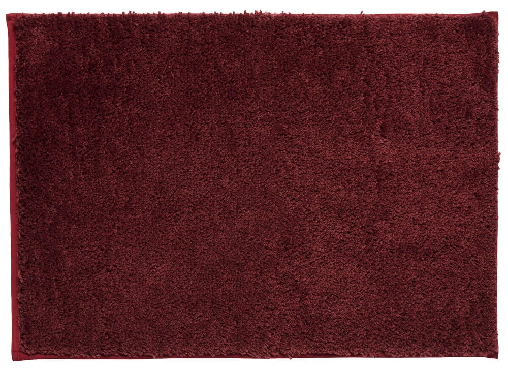 Badematte Majken 50x70 cm i gammelvinrød polyester med plysjtekstur.