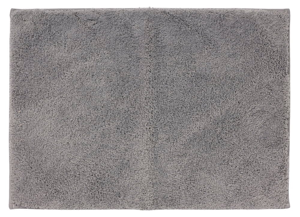 Lys grå rektangulær, fluffy badematte i polyester, ovenfra.