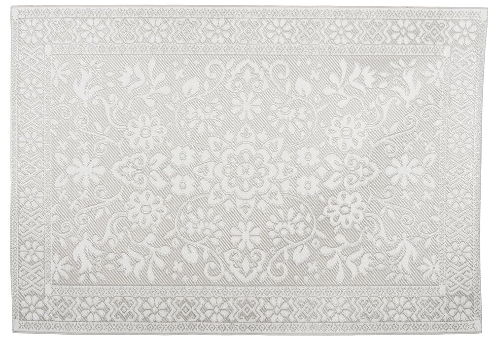 Silverfärgad mönstrad matta i polypropen med blommönster.