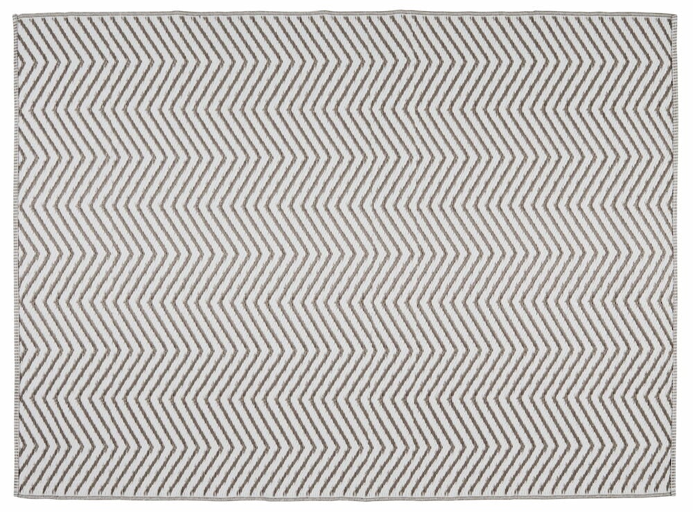 Ljusbrun vattentålig matta med zickzackmönster.