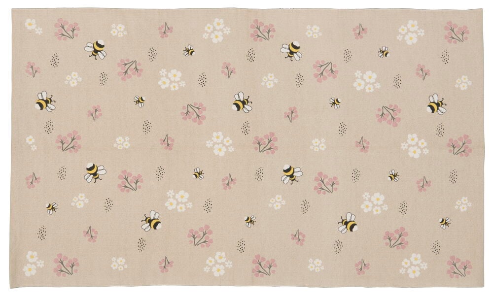 Benvit tygbit med humlor och rosa blommor.