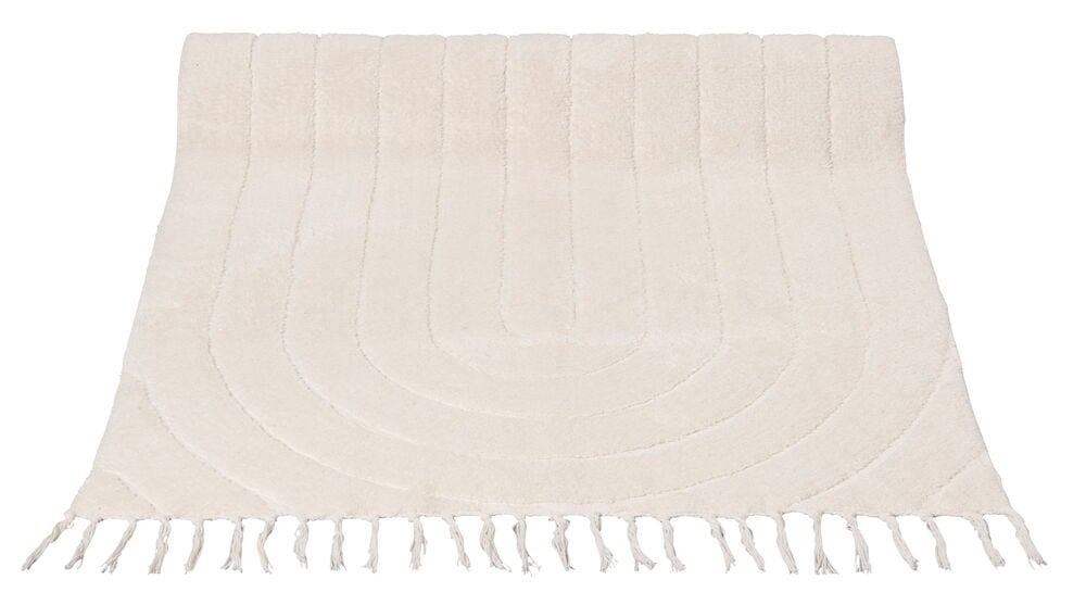 En vit bomullsduk med fransar.