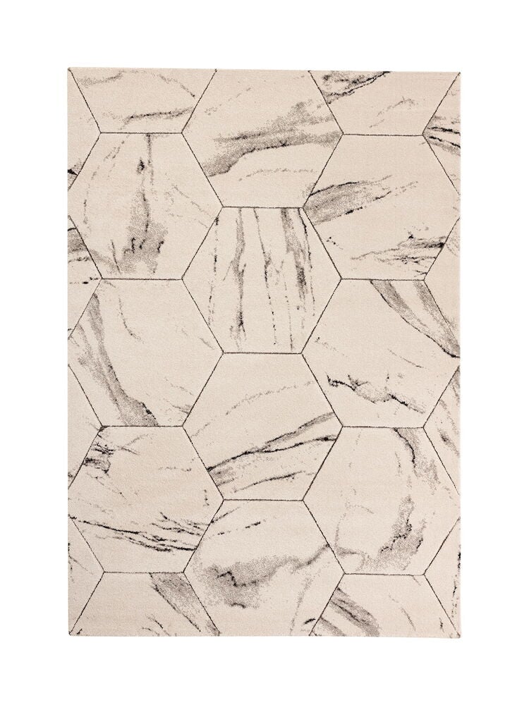 Vaalea matto, jossa on kuusikulmainen marmorikuvio.