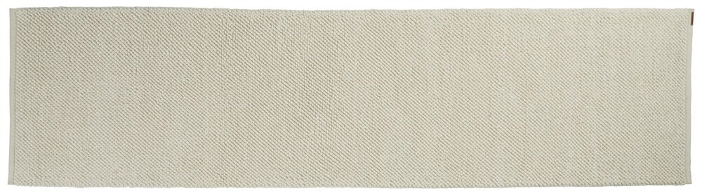 Avlang hvit håndvevd matte med enkel struktur.