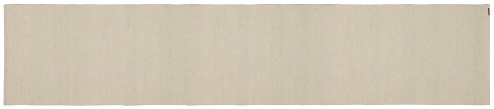 Beige suorakulmainen matto, yksinkertainen muotoilu.