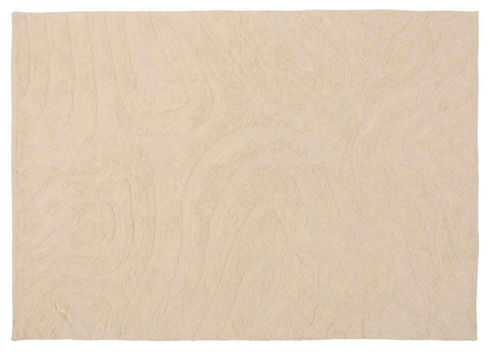 Off-white bomullsteppe Dizzy 160x230 cm med et hevet bølget abstrakt mønster.