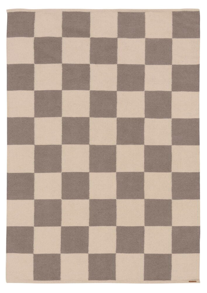 Grå och beige rutig rektangulär ullmatta.