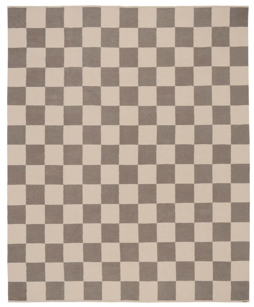 Grå ullmatta Elsaform Rutan med schackrutigt mönster i grått och beige.