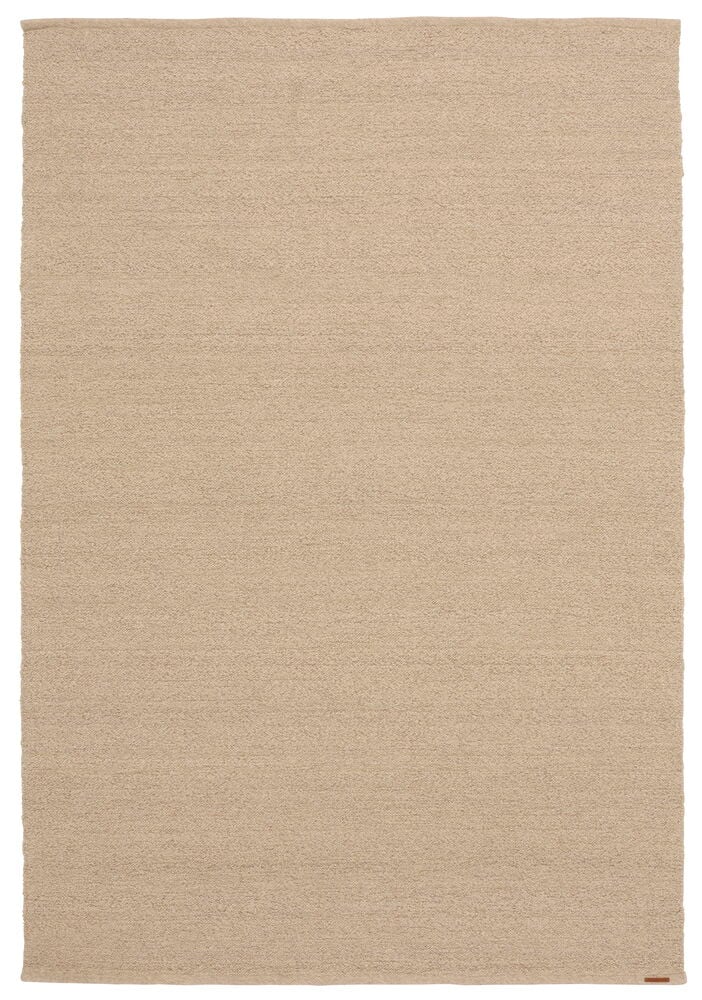 Helbild av en rektangulär beige Elsaform Bonnie matta i ullblandning med texturerad yta.