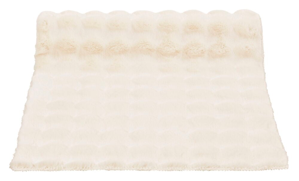 Beige mjukt tyg med fluffig textur.