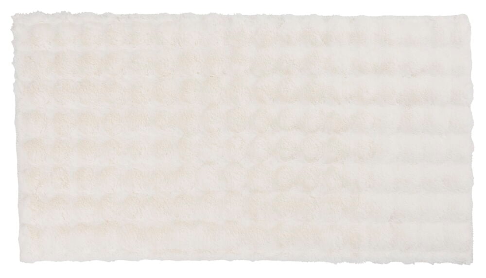 Vit ribbad polyesterduk med mjuk textur.