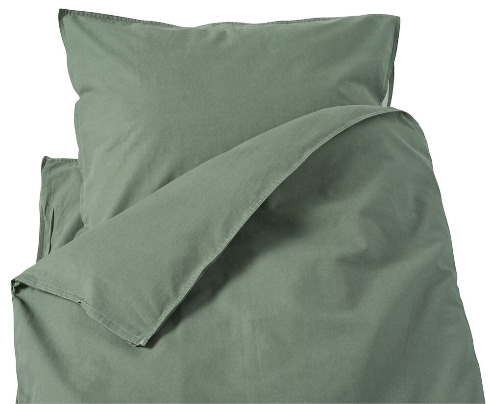 Vihreä pussilakanasetti ja tyynyliina puuvillasta.