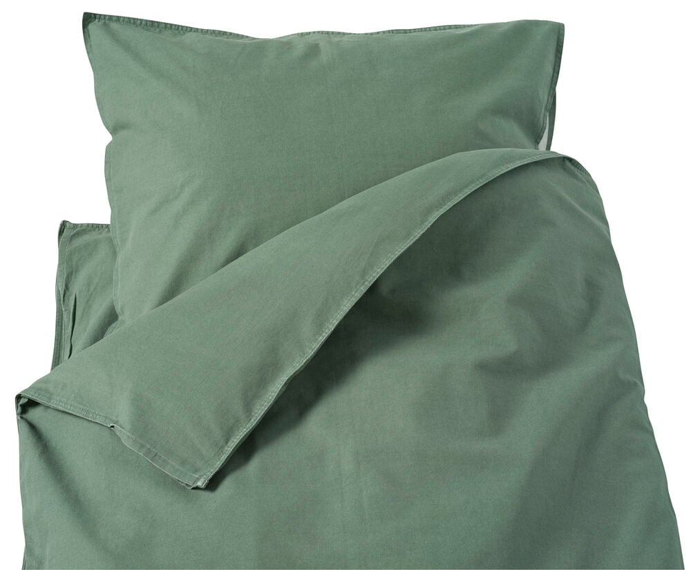 Grüne Baumwoll Bettwäsche-Set Vida mit gefaltetem Deckenbezug und Kissenbezug.
