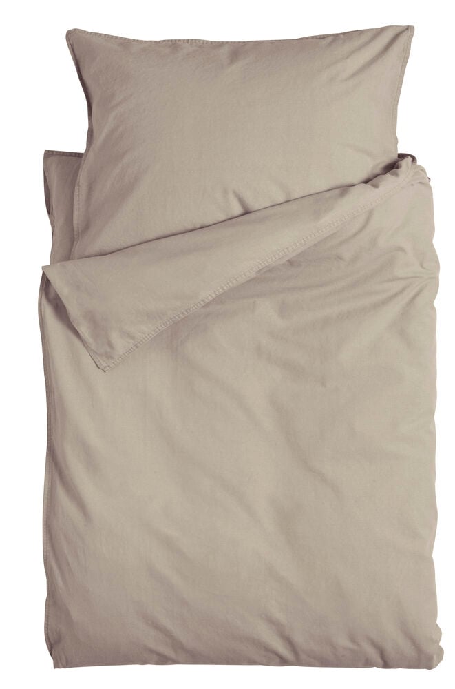 Ein naturfarbenes Bettwäsche-Set Vida 135x200 cm aus Baumwolle mit gefaltetem Bettbezug und Kissenbezug.