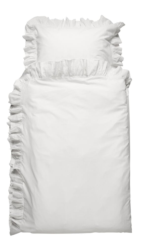 Valkoinen puuvillainen pussilakanasetti koristeellisilla röyhelöillä.