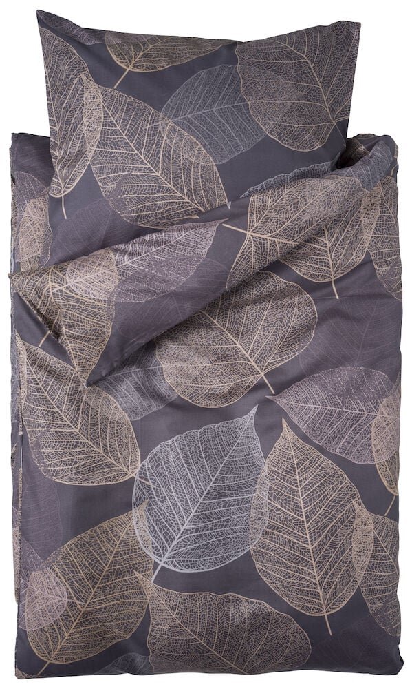 Påslakanset med bladmotiv i beige och brunt.