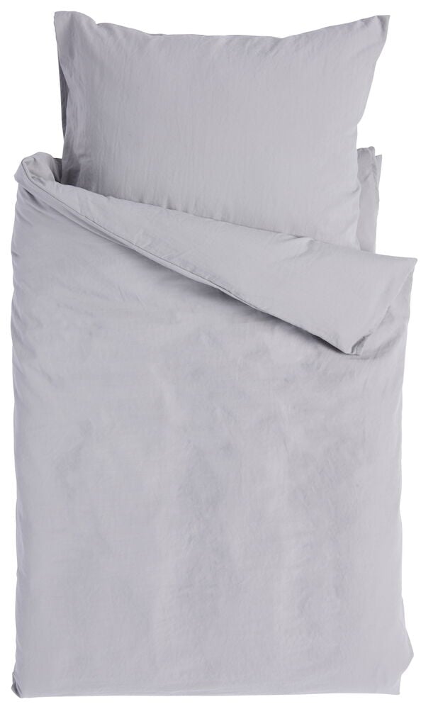 Grått påslakanset med kuddfodral i polyester.
