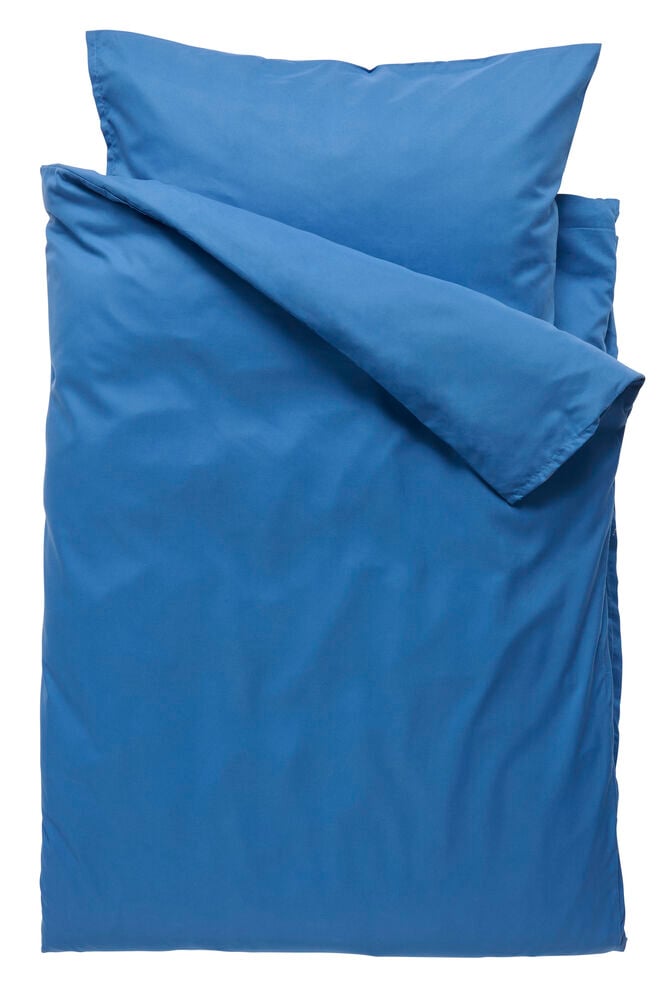 Blått påslakanset i polyester med kudde.