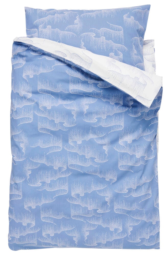 Sininen puuvillainen pussilakanasetti kuviolla ja tyynyliinalla.