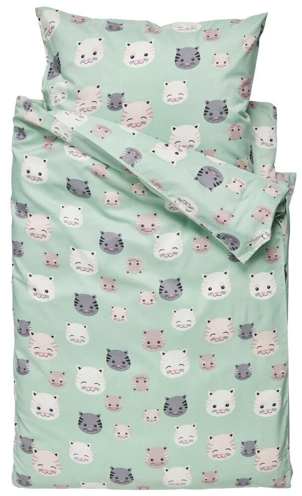Grönt påslakanset med tecknade kattansikten.