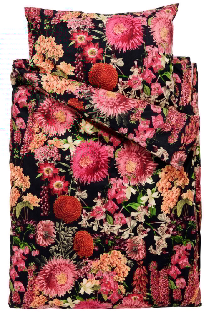 Tummanharmaa pussilakanasetti, jossa on värikäs kukkakuvio.