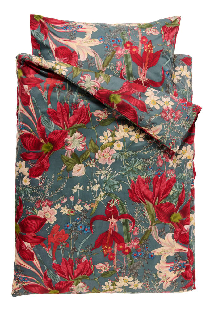 Sengesett Micro 135x200 cm Noelle Polyester, med mørk turkis bakgrunn og rødt blomstermønster.