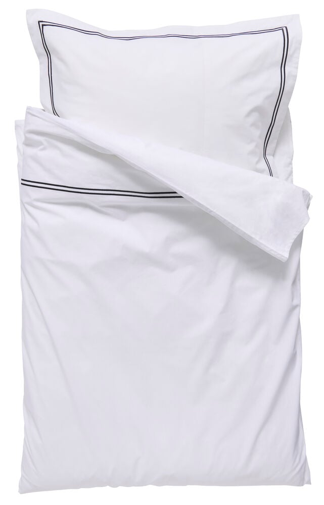 Vitt påslakanset med svarta linjer enkel design.