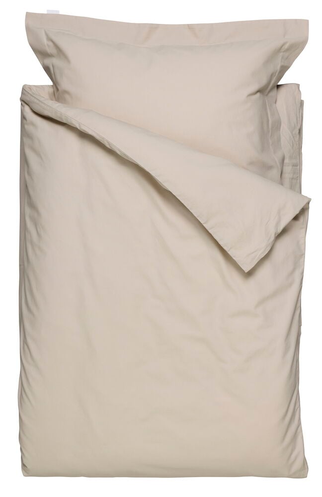 Beige Påslakanset Elsaform 150x200 cm med påslakan och örngott, lagt platt.